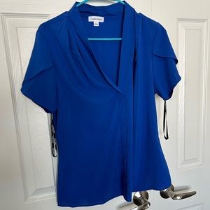 Women’s Calvin Klein Blouses. Size large.